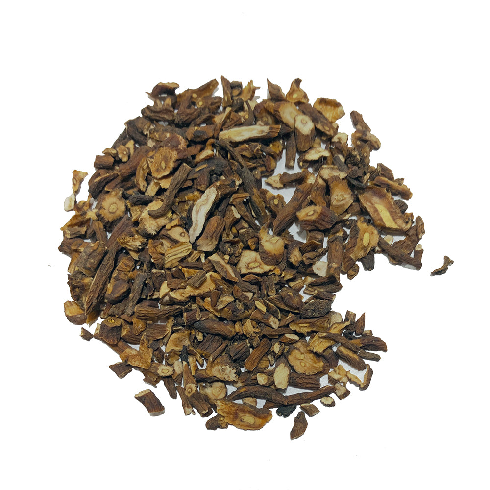 A circular arrangement of chopped earth-toned roots and herbs, varying in size, on a white background evokes organic detoxification, resembling Bondi Beach Tea Cos Raw Dandelion Root Tea - Organic.