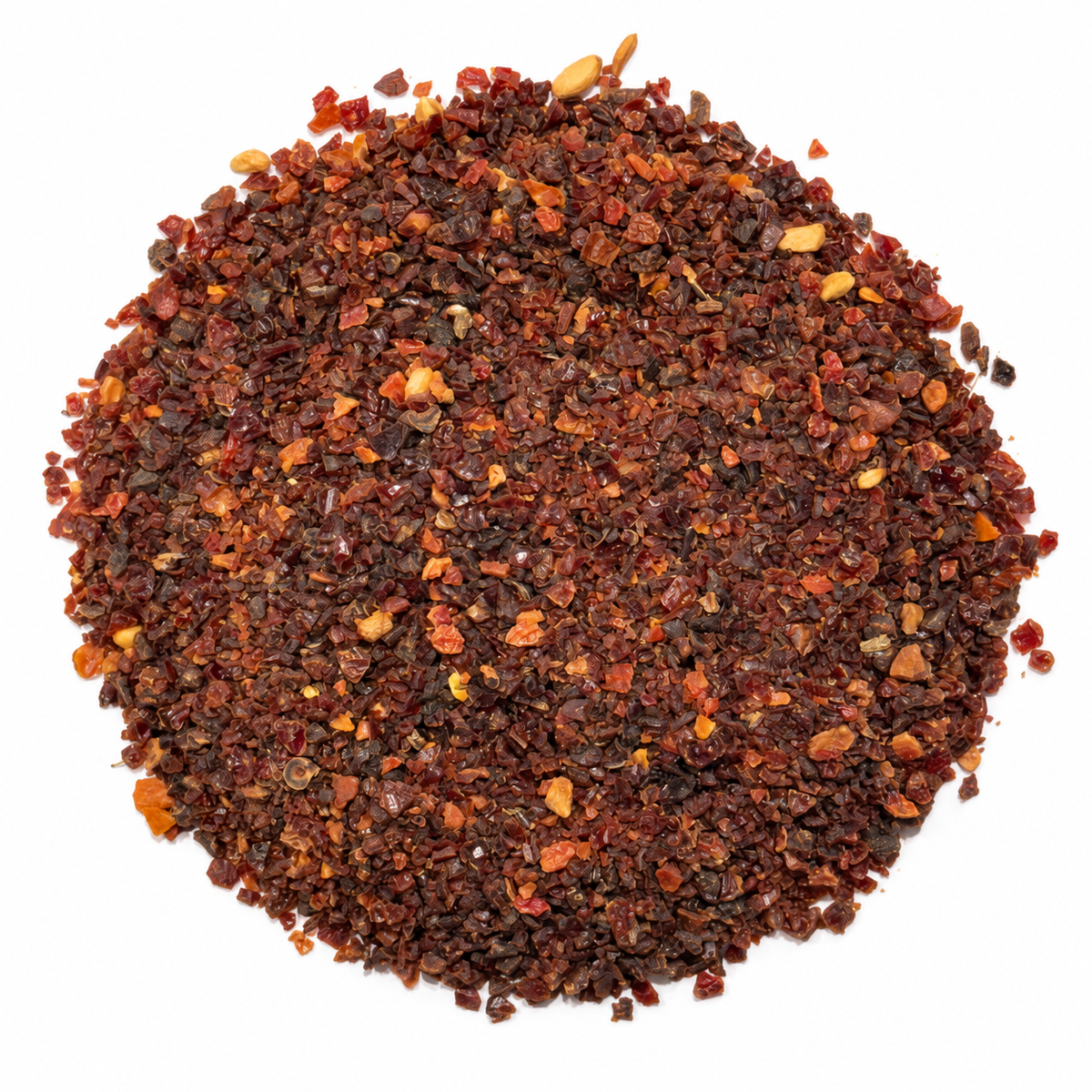 Dried rosehip granules on a white background