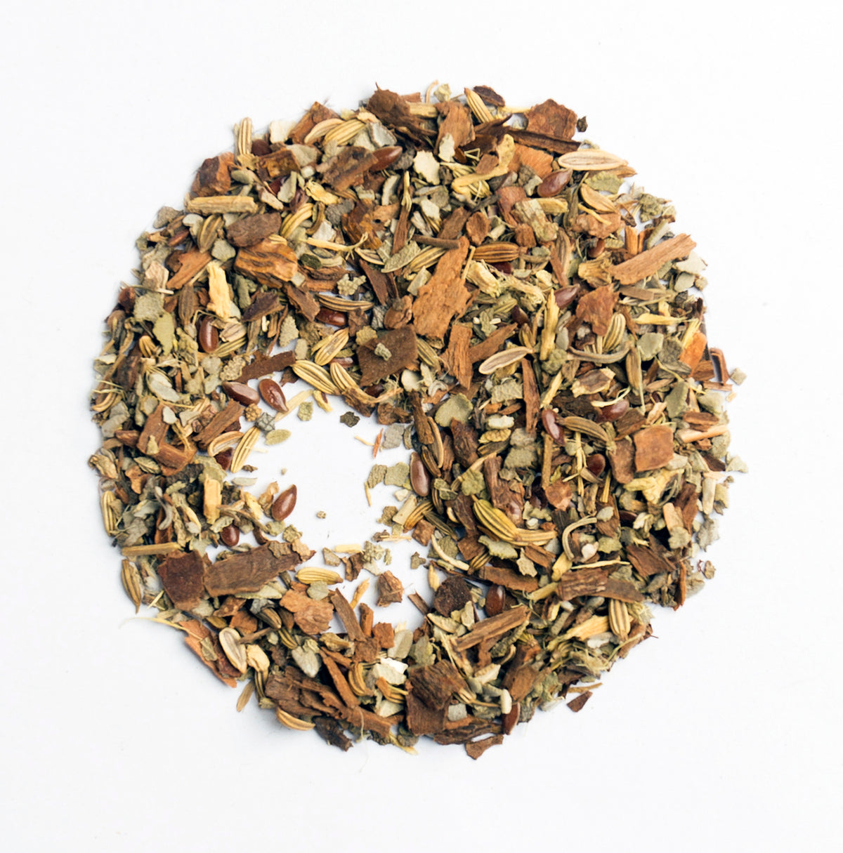 A circle of Menopause Daytime Tea Blend by Bondi Beach Tea Co on a white background, featuring an organic mix of dried fennel seeds, cinnamon, and ginger pieces. This aromatic and textured herbal tea offers an invigorating experience with its natural ingredients.